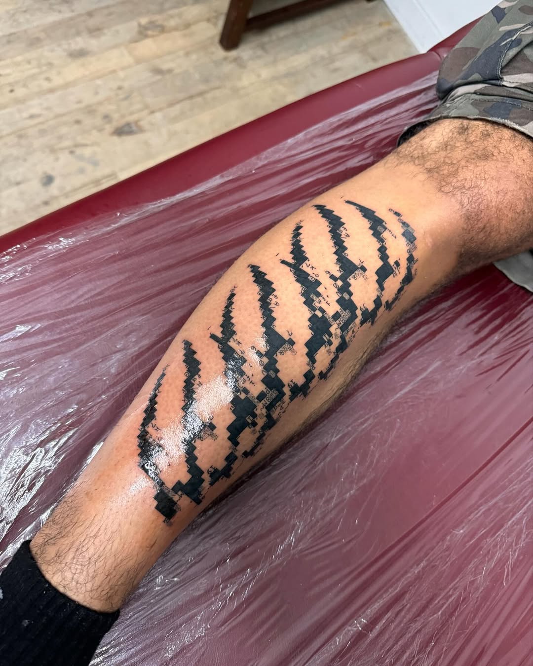 Tatouage cp437 jambe
