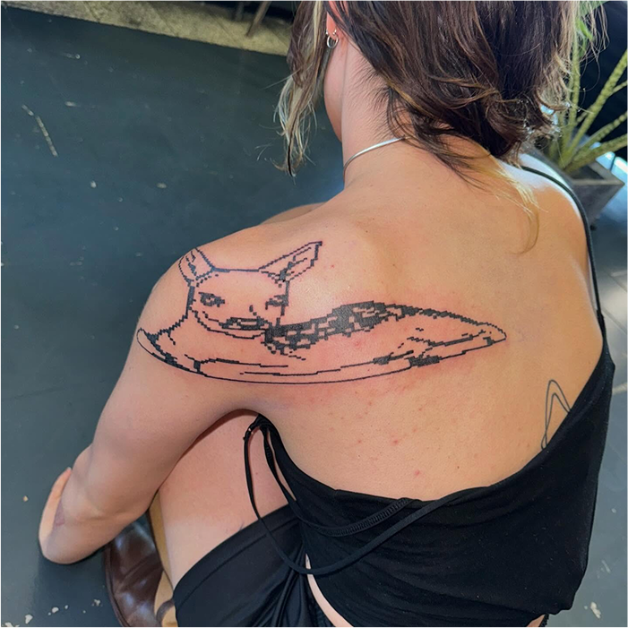 Tatouage pixel dos