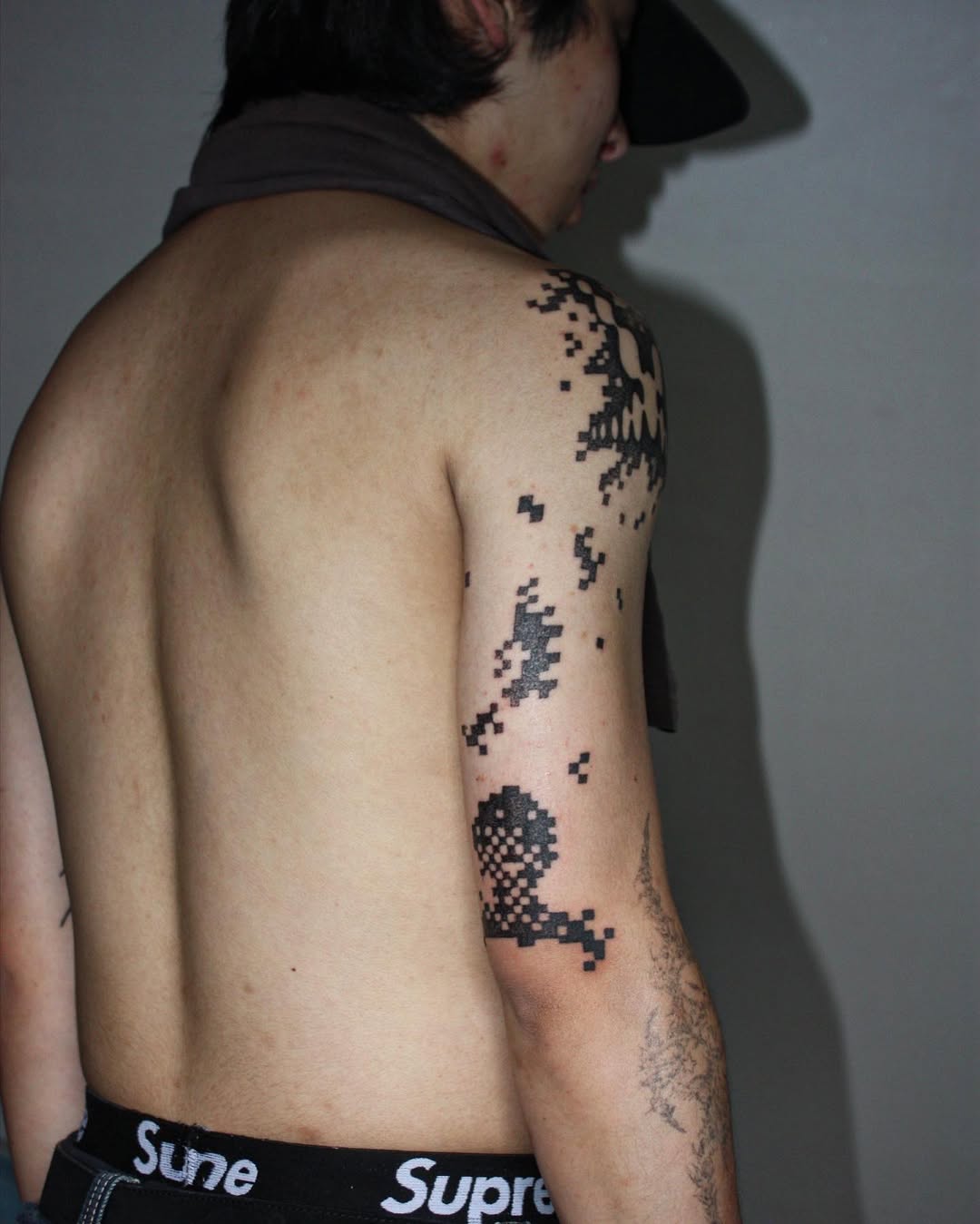 Tatouage pixel bras d 