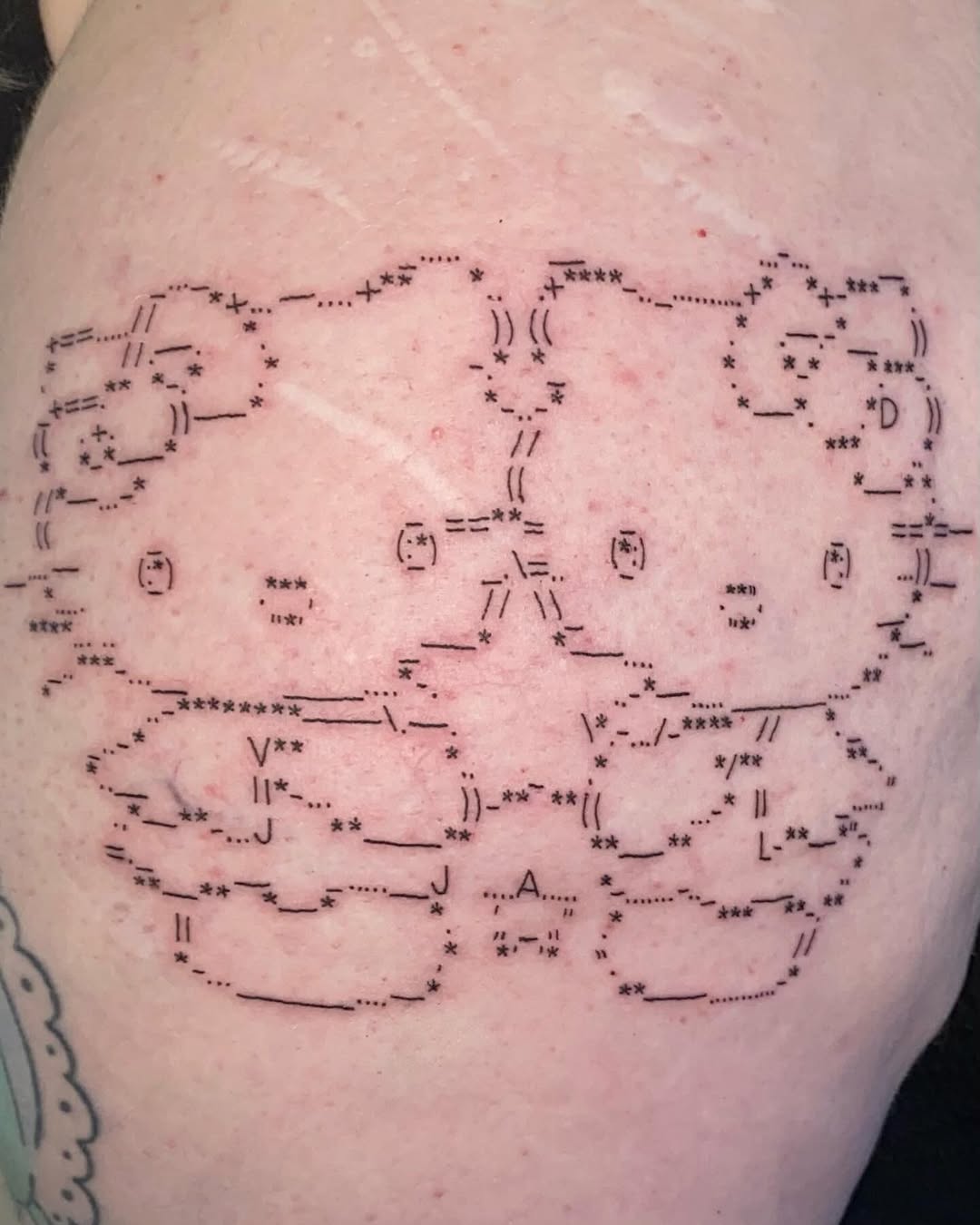 Tatouage epaule gauche